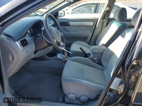 2006 Suzuki Forenza z VIN KL5JD56ZX6K278029, wystawiony jako Copart lot #82026904 z przebiegiem 117 700 mil mil oraz Szkoda całkowita • Salvage title. Historia ofert i sprzedaży dostępna na DreamBid. Obrazek 7.
