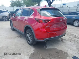 2019 Mazda CX-5 Touring with VIN JM3KFACM6K1549234, listed as a IAAI auction lot 42036633 with 85,065 mi miles and . Bid and sale history available at carsss.com. Image 3.