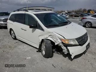 2012 Honda Odyssey Touring z VIN 5FNRL5H93CB070824, wystawiony jako Copart lot #49213465 z przebiegiem 287 745 mil mil oraz Szkoda całkowita • Salvage title. Historia ofert i sprzedaży dostępna na DreamBid. Obrazek 4.
