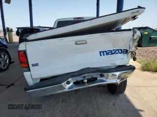 2000 Mazda B-Series 2WD Truck SE with VIN 4F4YR16C6YTM11839, listed as a Copart auction lot 64460754 with 245,958 mi miles and Salvage Title. Bid and sale history available at carsss.com. Image 6.