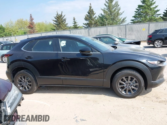 2021 Mazda CX-30 S with VIN 3MVDMBAL6MM264948, listed as a IAAI auction lot 42263077 with 13,614 mi miles and . Bid and sale history available at DreamBid. Image 13.