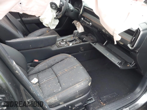 2024 Mazda CX-50 Premium Plus with VIN 7MMVABEY2RN234511, listed as a IAAI auction lot 41639766 with 8,705 mi miles and . Bid and sale history available at DreamBid. Image 5.