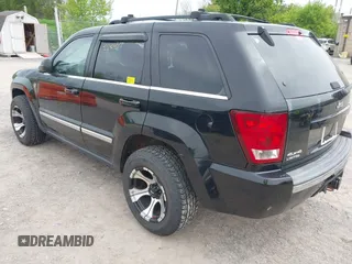 2006 Jeep Grand Cherokee Limited with VIN 1J8HR58NX6C165964, listed as a IAAI auction lot 42242453 with 112,670 mi miles and . Bid and sale history available at DreamBid. Image 3.