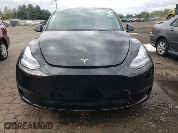 2022 Tesla Model Y Long Range z VIN 7SAYGDEEXNA008898, wystawiony jako Copart lot #54915445 z przebiegiem 35 467 mil mil oraz Szkoda całkowita • Salvage title. Historia ofert i sprzedaży dostępna na DreamBid. Obrazek 5.