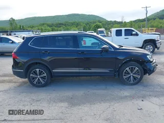 2018 Volkswagen Tiguan SEL z VIN 3VV2B7AXXJM145781, wystawiony jako IAAI lot #42273176 z przebiegiem 86 610 mil mil oraz . Historia ofert i sprzedaży dostępna na DreamBid. Obrazek 14.