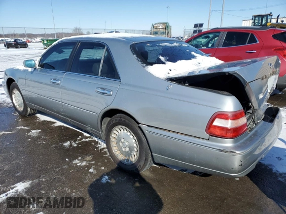 1999 Infiniti Q45 z VIN JNKBY31A2XM602927, wystawiony jako Copart lot #45627825 z przebiegiem 174 080 mil mil oraz Szkody całkowita. Historia ofert i sprzedaży dostępna na DreamBid. Obrazek 2.