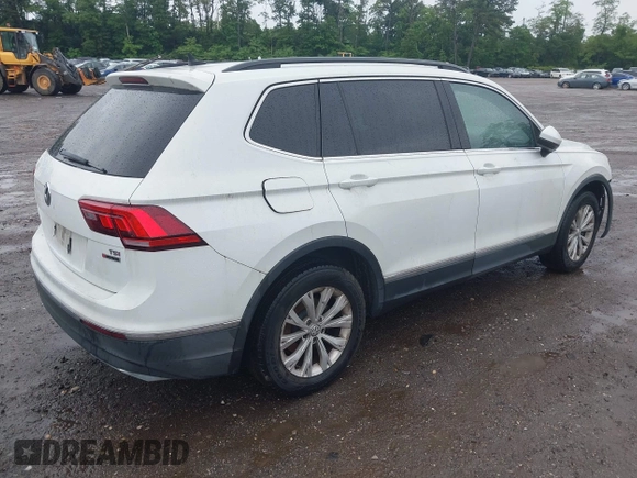 2018 Volkswagen Tiguan SEL with VIN 3VV2B7AX6JM059173, listed as a IAAI auction lot 42461175 with 86,679 mi miles and . Bid and sale history available at DreamBid. Image 4.