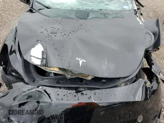 2024 Tesla Model Y z VIN 7SAYGDED7RF018059, wystawiony jako Copart lot #54273785 z przebiegiem 30 080 mil mil oraz Szkoda całkowita • Salvage title. Historia ofert i sprzedaży dostępna na DreamBid. Obrazek 11.