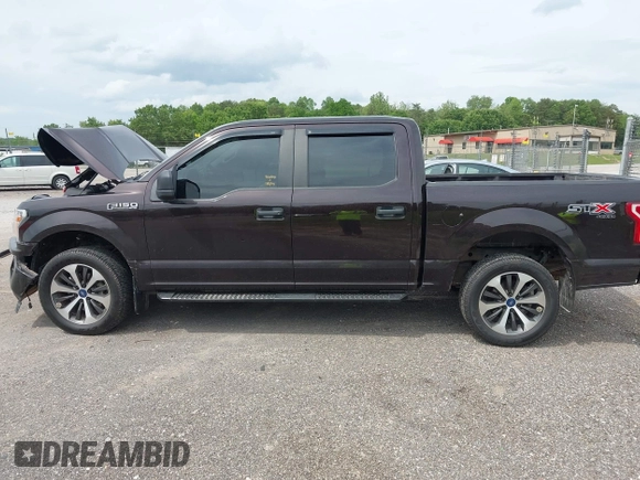 2020 Ford F-150 XL with VIN 1FTEW1EP3LFC56067, listed as a IAAI auction lot 42132791 with 103,357 mi miles and . Bid and sale history available at DreamBid. Image 14.