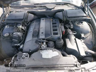 2000 BMW 5 Series 528iA with VIN WBADM6344YGU10257, listed as a IAAI auction lot 41773733 with 231,028 mi miles. Bid and sale history available at carsss.com. Image 10.