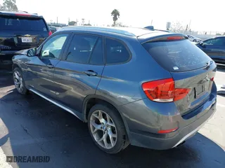 2014 BMW X1 xDrive28i with VIN WBAVL1C57EVY23722, listed as a IAAI auction lot 41839543 with 121,742 mi miles. Bid and sale history available at carsss.com. Image 3.