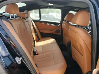 2023 BMW 5 Series 530i with VIN WBA53BH04PWY02486, listed as a Copart auction lot 54519385 with 26,979 mi miles and Salvage title. Bid and sale history available at DreamBid. Image 10.