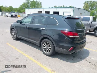 2017 Hyundai Santa Fe SE z VIN KM8SMDHF1HU213391, wystawiony jako IAAI lot #42415929 z przebiegiem 202 056 mil mil oraz . Historia ofert i sprzedaży dostępna na DreamBid. Obrazek 3.