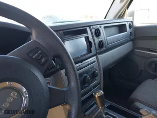 2006 Jeep Commander with VIN 1J8HG48K76C330603, listed as a IAAI auction lot 41183106 with 1 mi miles. Bid and sale history available at carsss.com. Image 6.