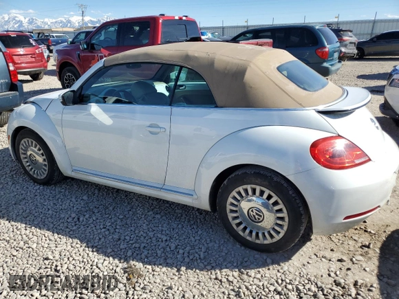 2014 Volkswagen Beetle 1.8T with VIN 3VW517AT4EM818949, listed as a Copart auction lot 49615915 with 103,682 mi miles and Salvage title. Bid and sale history available at DreamBid. Image 2.