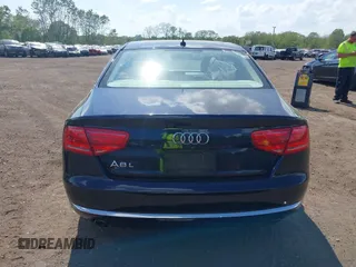2014 Audi A8 3.0T z VIN WAURGAFD7EN005979, wystawiony jako IAAI lot #42169900 z przebiegiem 126 523 mil mil oraz . Historia ofert i sprzedaży dostępna na DreamBid. Obrazek 16.