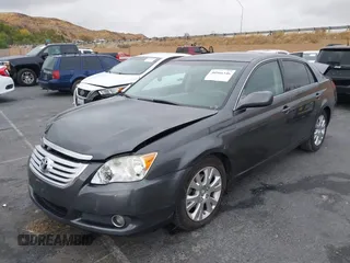 2010 Toyota Avalon XL with VIN 4T1BK3DB2AU368105, listed as a IAAI auction lot 40966346 with 147,122 mi miles and . Bid and sale history available at DreamBid. Image 2.