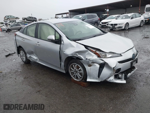 2022 Toyota Prius L Eco with VIN JTDKAMFU1N3177055, listed as a IAAI auction lot 41506862 with 121,318 mi miles and . Bid and sale history available at DreamBid. Image 1.