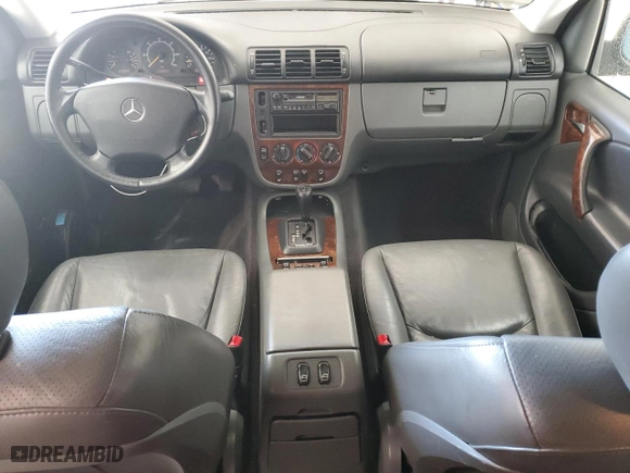 1999 Mercedes-Benz M-Class with VIN 4JGAB54E7XA136885, listed as a Copart auction lot 42031775 with 173,079 mi miles and Salvage Title. Bid and sale history available at carsss.com. Image 8.