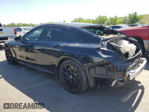 2021 BMW 8 Series M850i with VIN WBAGV8C00MCF55108, listed as a Copart auction lot 56305084 with 27,399 mi miles and Salvage Title. Bid and sale history available at DreamBid. Image 2.