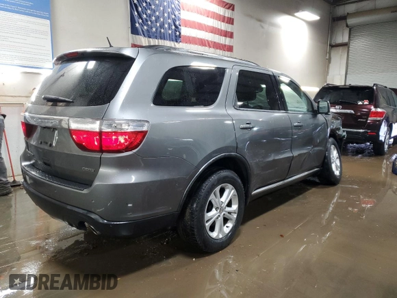 2012 Dodge Durango Crew with VIN 1C4RDJDG1CC100717, listed as a Copart auction lot 47446365 with 103,539 mi miles and Salvage Title. Bid and sale history available at carsss.com. Image 3.