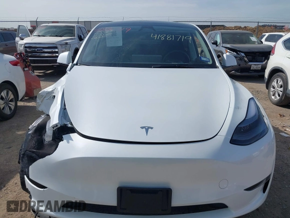 2025 Tesla Model Y Long Range z VIN 7SAYGDED7SA373784, wystawiony jako IAAI lot #41881719 z przebiegiem 1 192 mil mil oraz . Historia ofert i sprzedaży dostępna na DreamBid. Obrazek 12.
