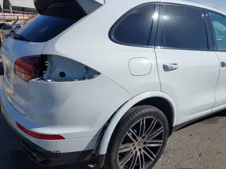 2017 Porsche Cayenne with VIN WP1AA2A23HKA80695, listed as a IAAI auction lot 41532359 with 71,628 mi miles. Bid and sale history available at carsss.com. Image 6.