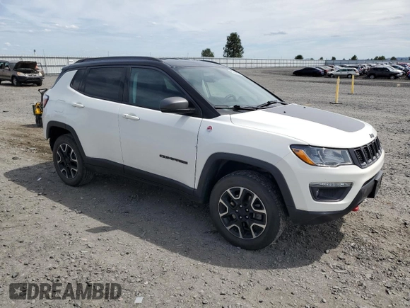 2020 Jeep Compass Trailhawk with VIN 3C4NJDDB5LT195235, listed as a Copart auction lot 62344635 with 65,378 mi miles and Salvage title. Bid and sale history available at DreamBid. Image 4.