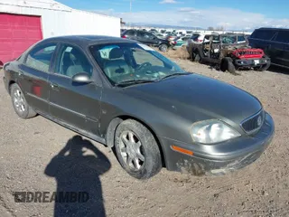 2002 Mercury Sable LS Premium with VIN 1MEHM55S72G637376, listed as a IAAI auction lot 41563505 with 165,007 mi miles. Bid and sale history available at carsss.com. Image 1.