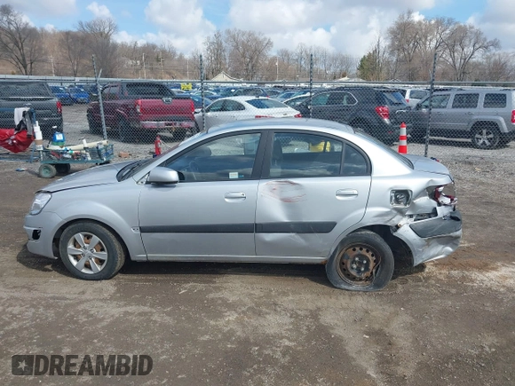2009 Kia Rio LX with VIN KNADE223796521410, listed as a IAAI auction lot 41887883 with 82,360 mi miles and . Bid and sale history available at DreamBid. Image 13.
