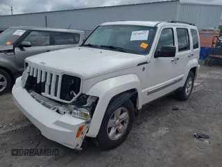 2010 Jeep Liberty Sport z VIN 1J4PN2GKXAW113367, wystawiony jako IAAI lot #42743577 z przebiegiem 118 063 mil mil oraz . Historia ofert i sprzedaży dostępna na DreamBid. Obrazek 2.