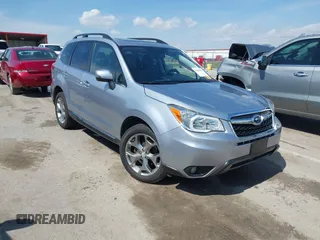 2016 Subaru Forester 2.5i Touring with VIN JF2SJAVC8GH493549, listed as a IAAI auction lot 41875775 with 74,767 mi miles. Bid and sale history available at carsss.com. Image 1.