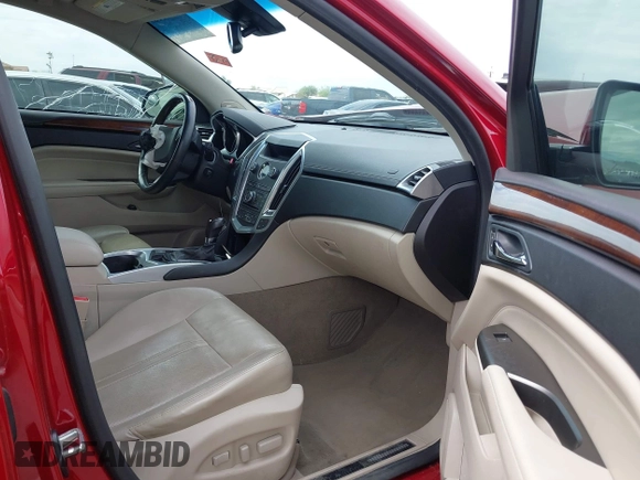 2012 Cadillac SRX Premium Collection with VIN 3GYFNCE3XCS610463, listed as a IAAI auction lot 41911167 with 148,118 mi miles and . Bid and sale history available at DreamBid. Image 5.