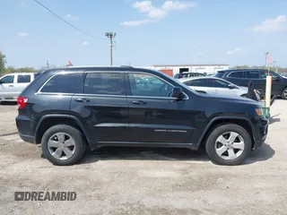 2014 Jeep Grand Cherokee Laredo with VIN 1C4RJFAG1EC315544, listed as a IAAI auction lot 42105987 with 164,430 mi miles. Bid and sale history available at carsss.com. Image 13.