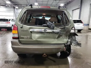 2002 Mazda Tribute LX with VIN 4F2CU08192KM29966, listed as a Copart auction lot 79458124 with 186,406 mi miles and Salvage Title. Bid and sale history available at carsss.com. Image 6.