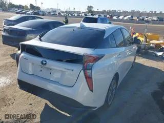 2016 Toyota Prius Four with VIN JTDKARFU5G3018734, listed as a IAAI auction lot 41825707 with 111,564 mi miles. Bid and sale history available at carsss.com. Image 4.