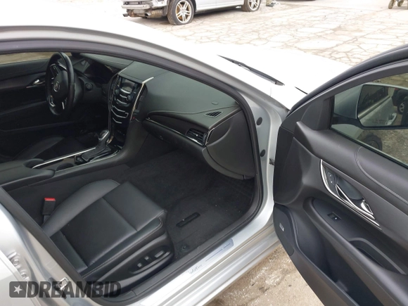 2014 Cadillac ATS Standard AWD with VIN 1G6AG5RX9E0179422, listed as a IAAI auction lot 41826487 with 121,061 mi miles and . Bid and sale history available at carsss.com. Image 5.