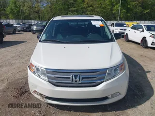 2013 Honda Odyssey Touring with VIN 5FNRL5H96DB009694, listed as a IAAI auction lot 42002487 with 182,867 mi miles and . Bid and sale history available at carsss.com. Image 12.