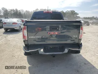 2019 GMC Canyon 4WD SLE with VIN 1GTG6CEN1K1129624, listed as a Copart auction lot 44106575 with 106,734 mi miles and Salvage Title. Bid and sale history available at carsss.com. Image 6.