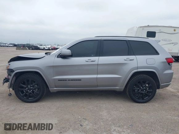 2019 Jeep Grand Cherokee Laredo E with VIN 1C4RJFAG9KC670974, listed as a IAAI auction lot 42333028 with 163,958 mi miles and . Bid and sale history available at DreamBid. Image 15.