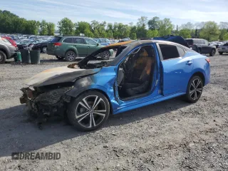 2021 Nissan Sentra SR z VIN 3N1AB8DV1MY322759, wystawiony jako Copart lot #58248865 z przebiegiem Nie podano mil oraz Szkoda całkowita • Salvage title. Historia ofert i sprzedaży dostępna na DreamBid. Obrazek 1.