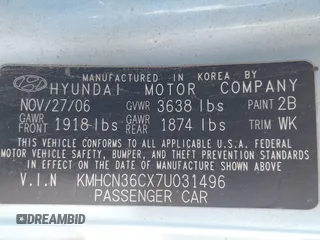 2007 Hyundai Accent SE with VIN KMHCN36CX7U031496, listed as a IAAI auction lot 41811183 with 201,740 mi miles. Bid and sale history available at carsss.com. Image 9.