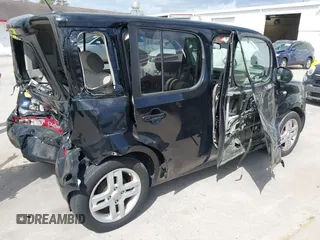 2009 Nissan Cube SL z VIN JN8AZ28R59T103584, wystawiony jako IAAI lot #41685022 z przebiegiem 158 810 mil mil oraz . Historia ofert i sprzedaży dostępna na DreamBid. Obrazek 4.