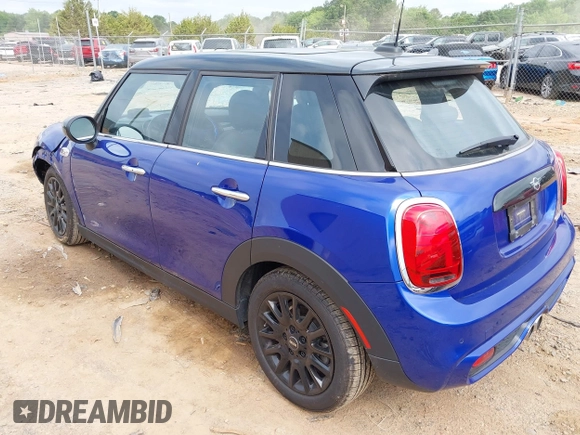 2021 MINI Hardtop 4 Door Cooper S with VIN WMWXU9C00M2N60370, listed as a IAAI auction lot 42426257 with 11,288 mi miles and . Bid and sale history available at DreamBid. Image 3.
