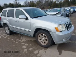 2009 Jeep Grand Cherokee Limited with VIN 1J8HR58P99C538725, listed as a IAAI auction lot 41466122 with 220,803 mi miles. Bid and sale history available at carsss.com. Image 1.