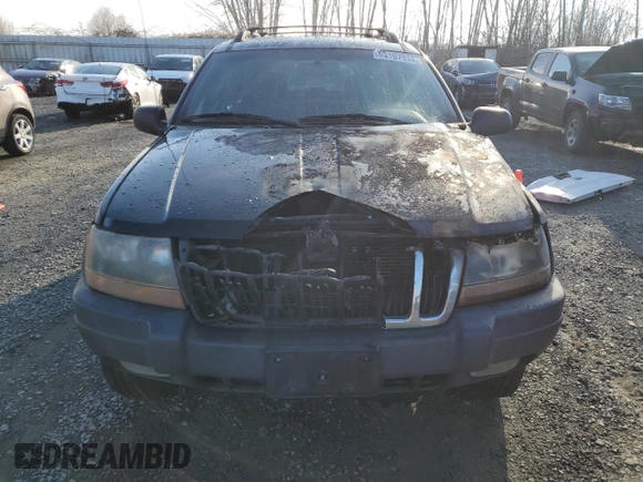 1999 Jeep Grand Cherokee Laredo z VIN 1J4GW58N1XC737706, wystawiony jako Copart lot #83107914 z przebiegiem Nie podano mil oraz Szkoda całkowita • Salvage title. Historia ofert i sprzedaży dostępna na DreamBid. Obrazek 5.