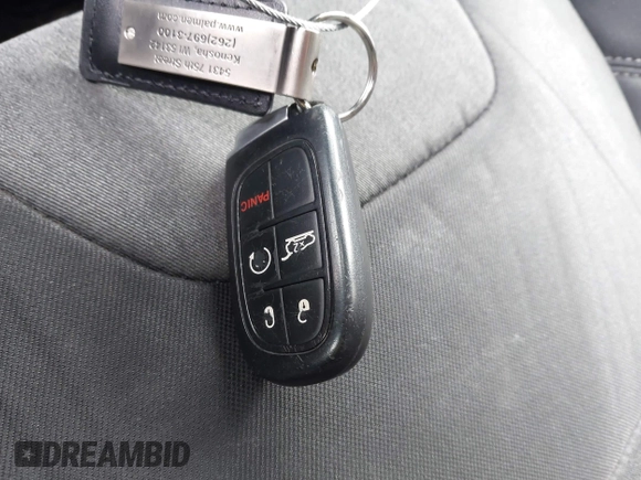 2014 Jeep Cherokee Latitude with VIN 1C4PJMCS0EW291135, listed as a IAAI auction lot 41860372 with 171,524 mi miles and . Bid and sale history available at DreamBid. Image 11.