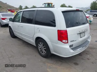 2014 Dodge Grand Caravan SXT with VIN 2C4RDGCG1ER304836, listed as a IAAI auction lot 42049558 with 186,831 mi miles and . Bid and sale history available at DreamBid. Image 3.