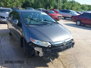 2013 Honda Insight EX z VIN JHMZE2H74DS002123, wystawiony jako IAAI lot #42204860 z przebiegiem 279 376 mil mil oraz . Historia ofert i sprzedaży dostępna na DreamBid. Obrazek 1.