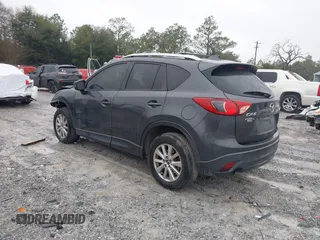 2015 Mazda CX-5 Touring with VIN JM3KE2CY4F0435563, listed as a IAAI auction lot 41311988 with 187,183 mi miles. Bid and sale history available at carsss.com. Image 3.